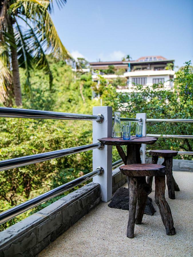 Joy'S Homestay Тау Экстерьер фото